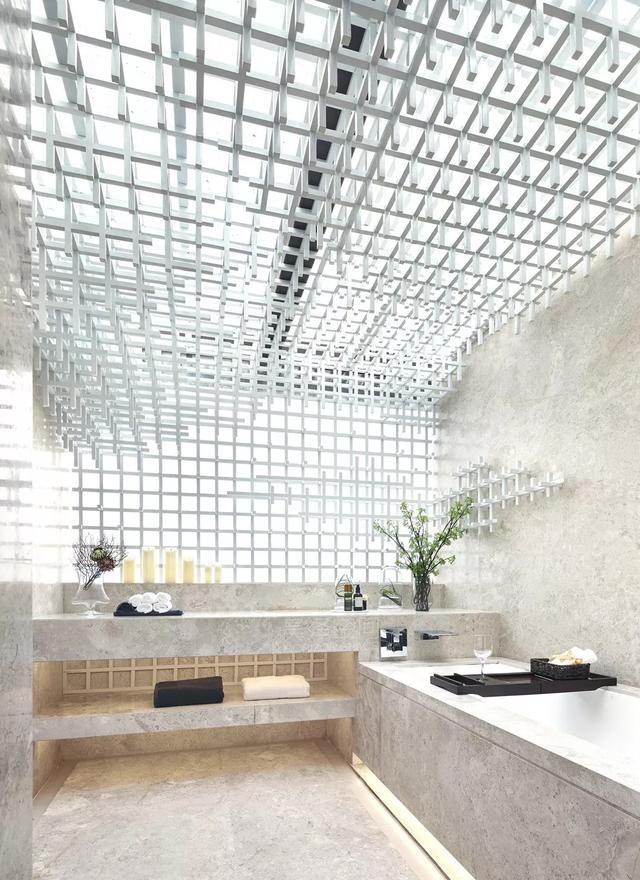 办公高档装修(办公楼装修：无框玻璃与网状天花 实现科技与美学融合)